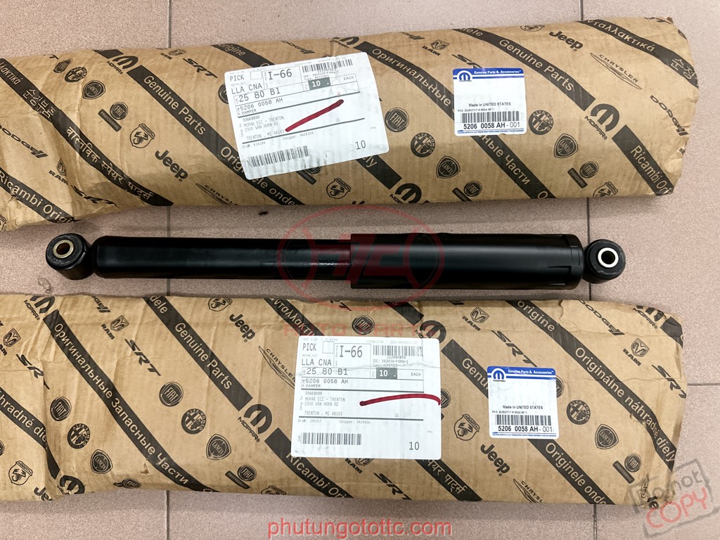 Giảm chấn lái Jeep Wrangler 2010 (52060058AF)